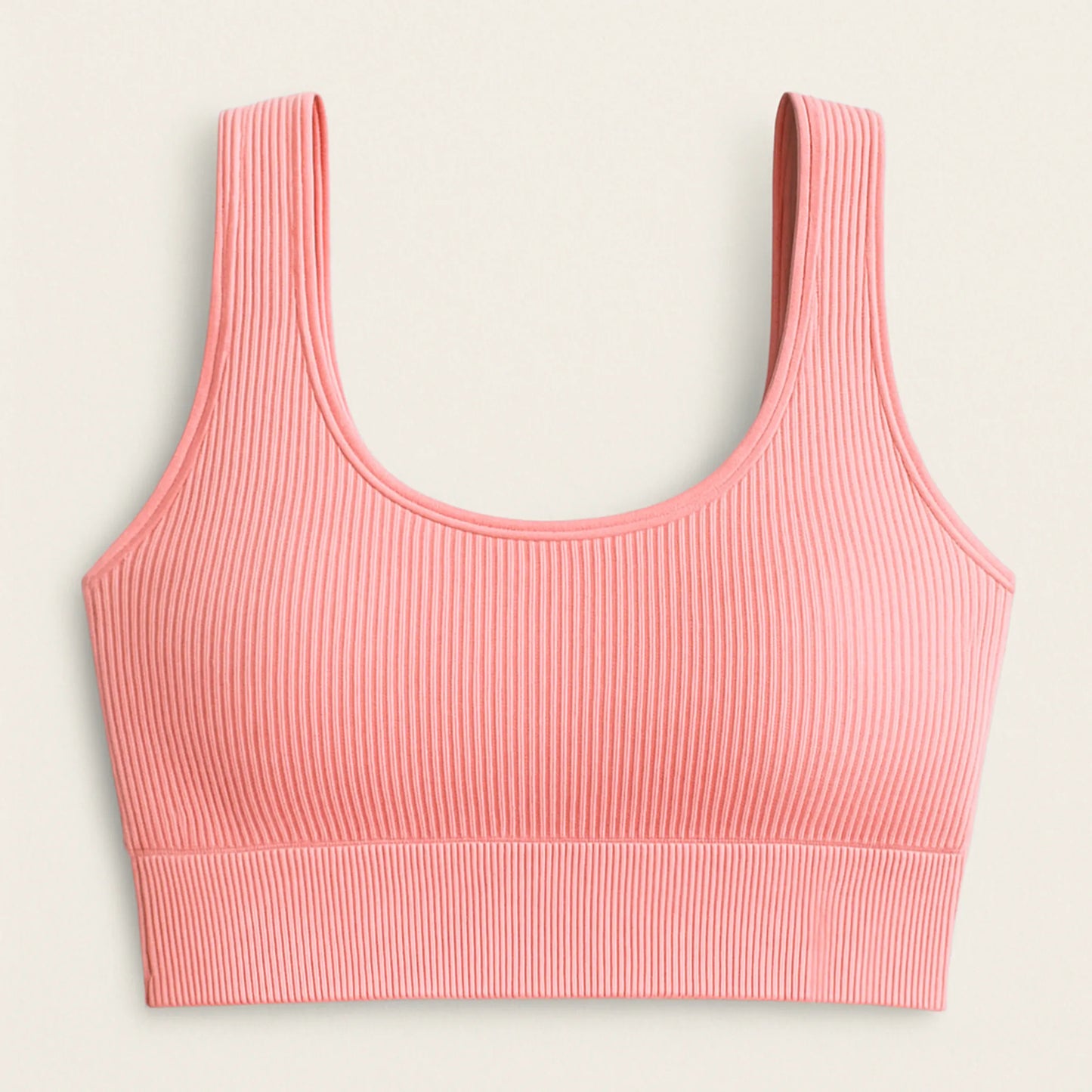 Detalle del tejido sin costuras del bra deportivo ADAFIT, con textura suave acanalado para mayor confort color Palo de rosa